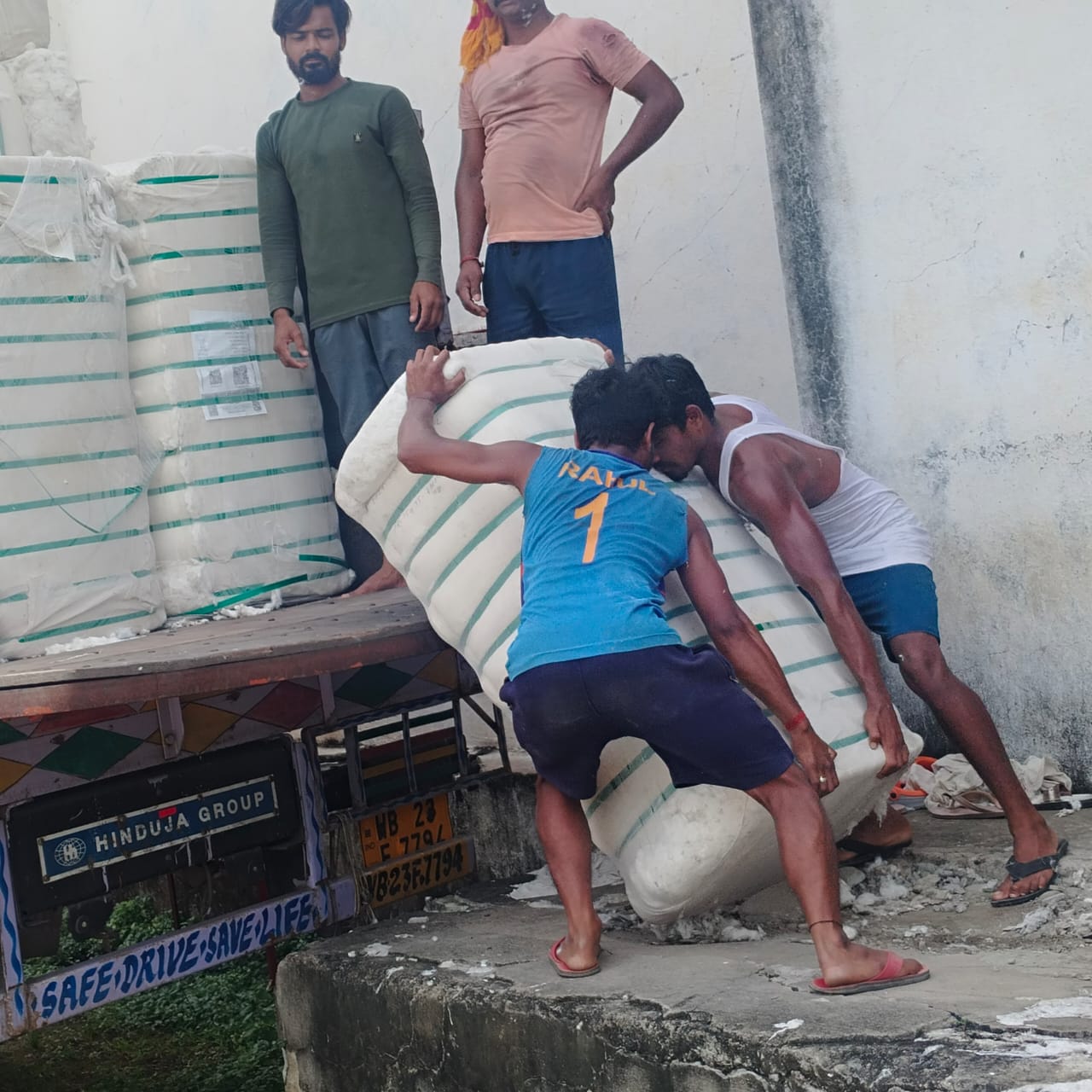 Loading cotton bales safely